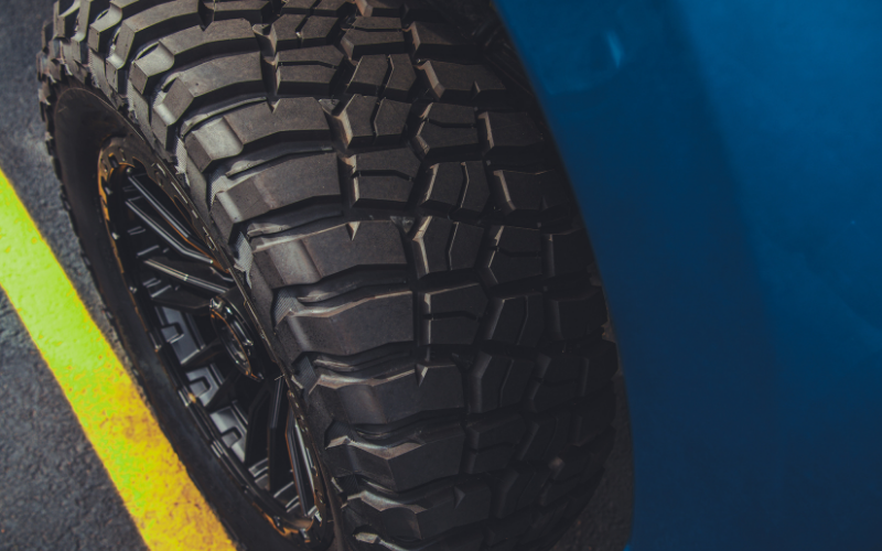 Truck tire on off-road terrain